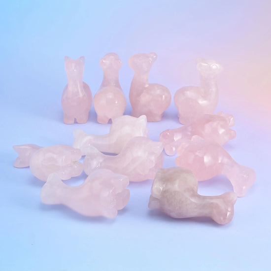 2 inch alpaca crystal carving with a long neck, tipped ears and tucked legs, polished to a high shine