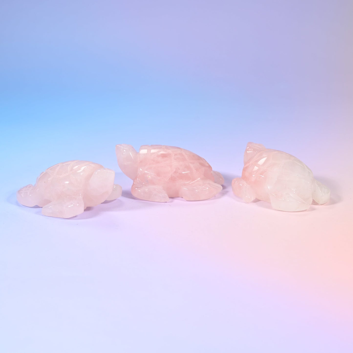 2 inch sea turtle crystal carving with a domed shell and tucked flippers, polished to a high shine