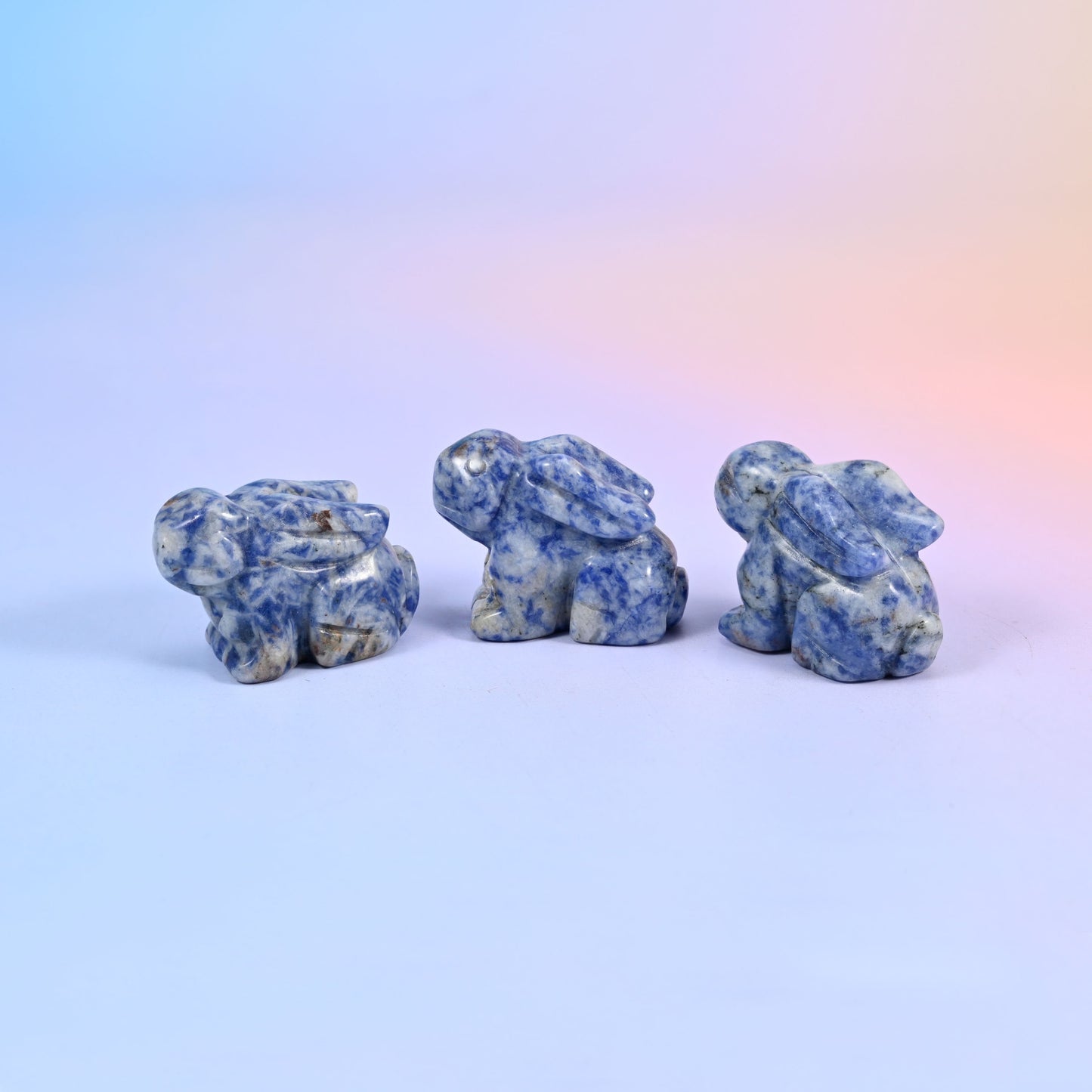 1.5 inch carved stone rabbit figurine, natural stone so veining and colour vary piece to piece