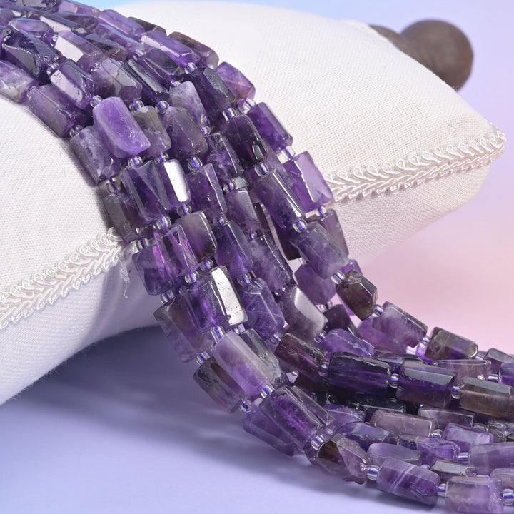 Natural Amethyst faceted tube beads in a beautiful purple hue.