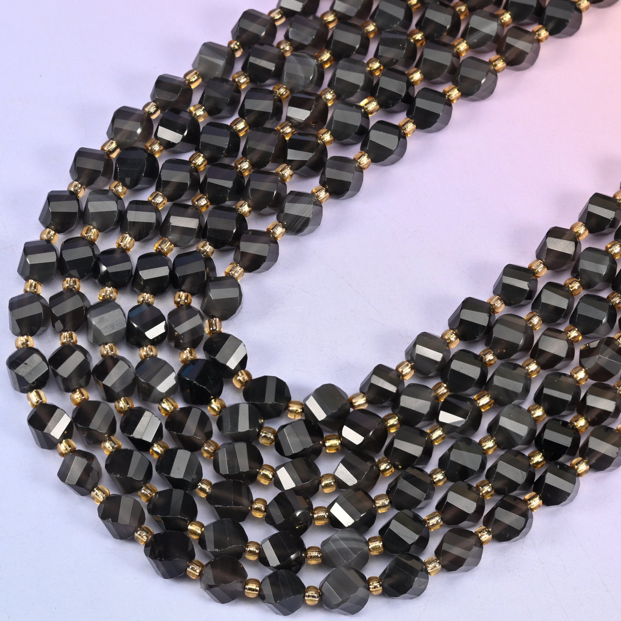 Ice obsidian natural stone beads, eight-sided spiral twist cut catching light on every facet, 8mm