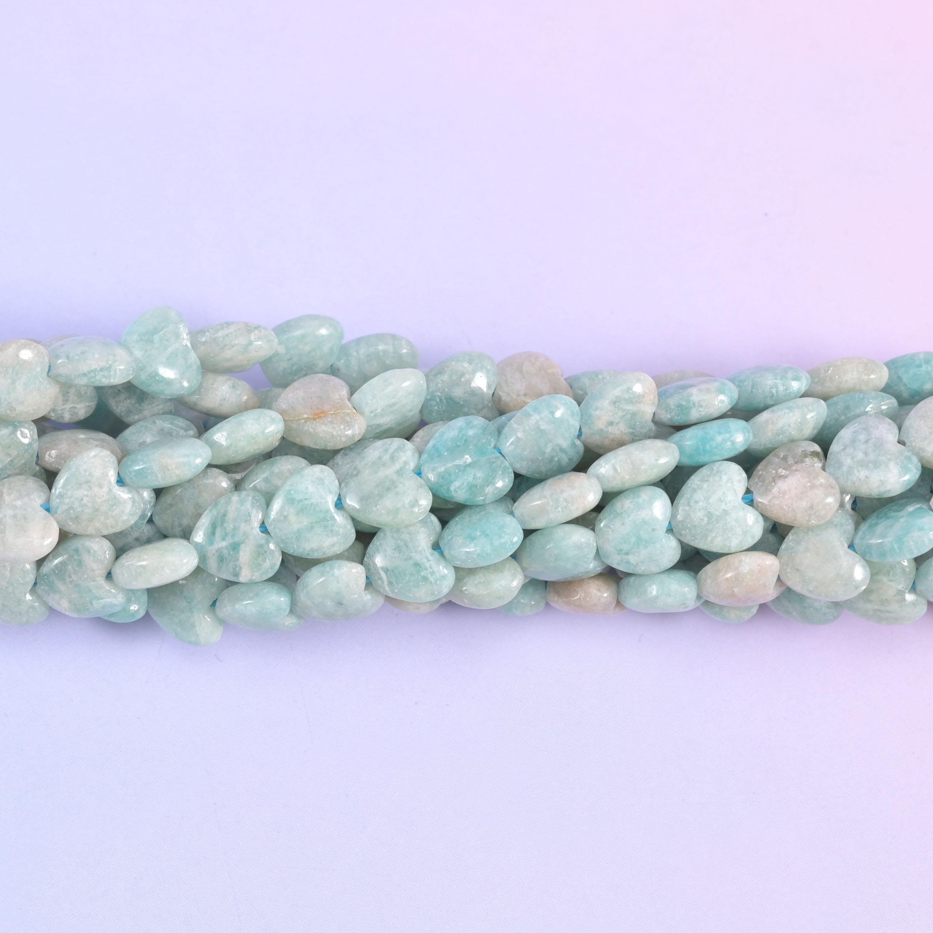 Macro view of Amazonite hearts showing their small puffed profile