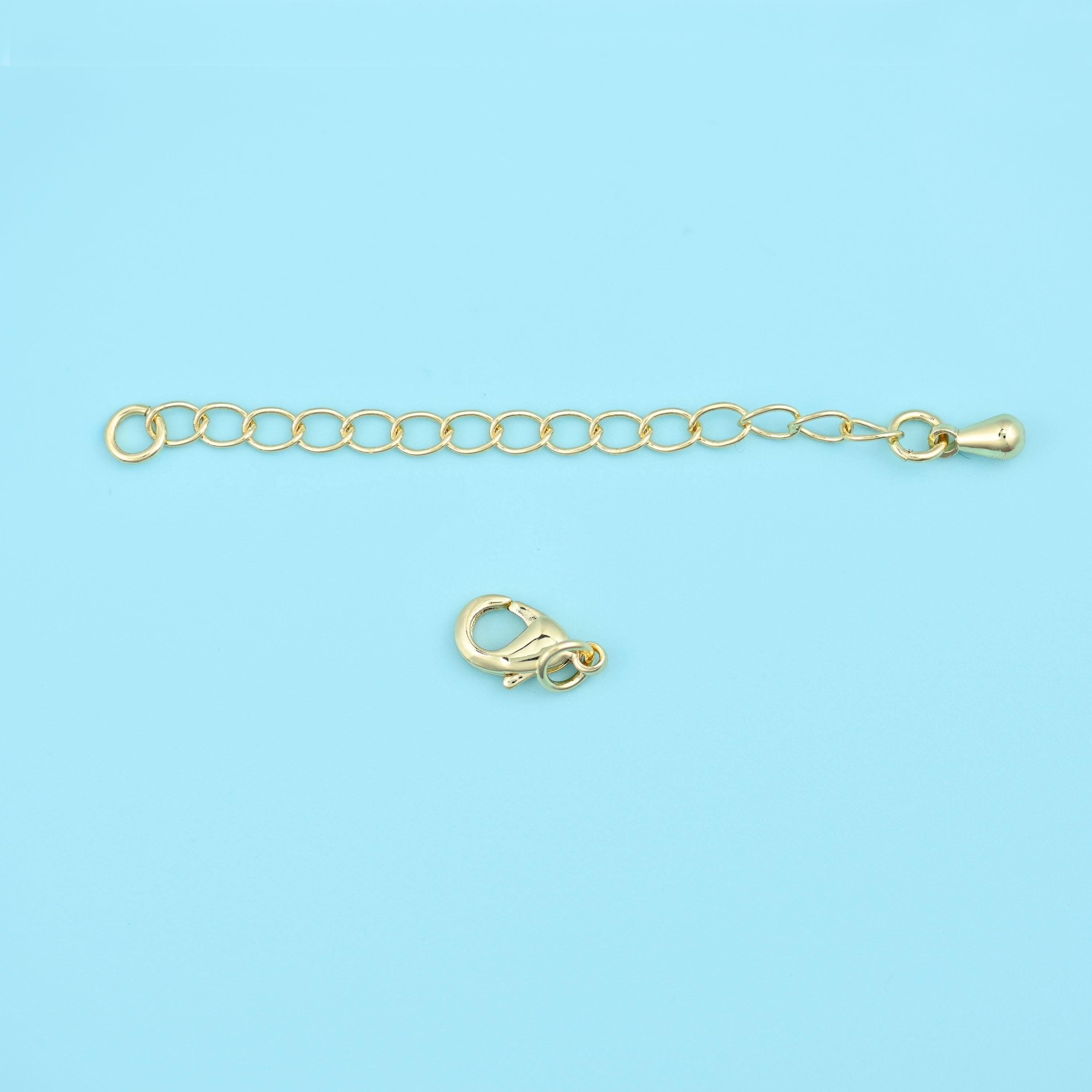 A short run of open oval links in warm gold, with a lobster clasp at one end and a small tag at the other. Add it to a finished necklace to gain length