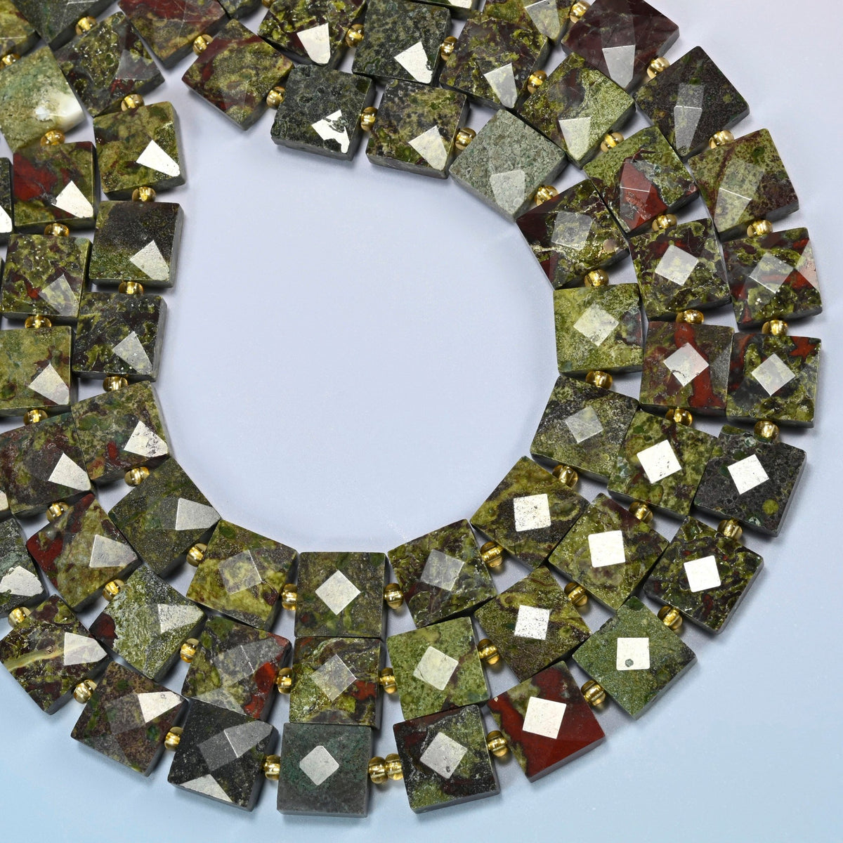 Natural dragon blood stone faceted flat square beads curved into an open loop, olive green and dark red beads
