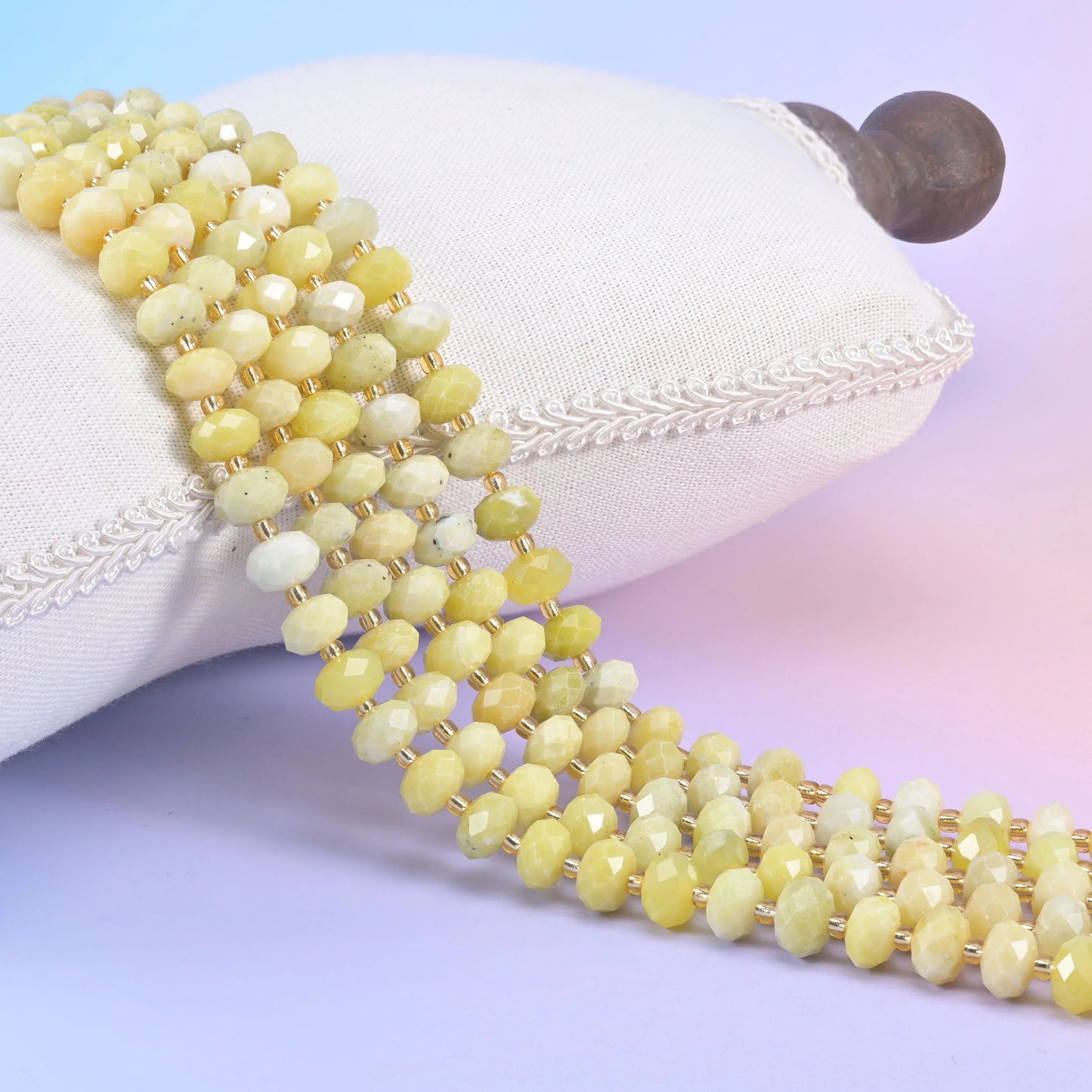 Natural gemstone rondelle beads with a faceted cut