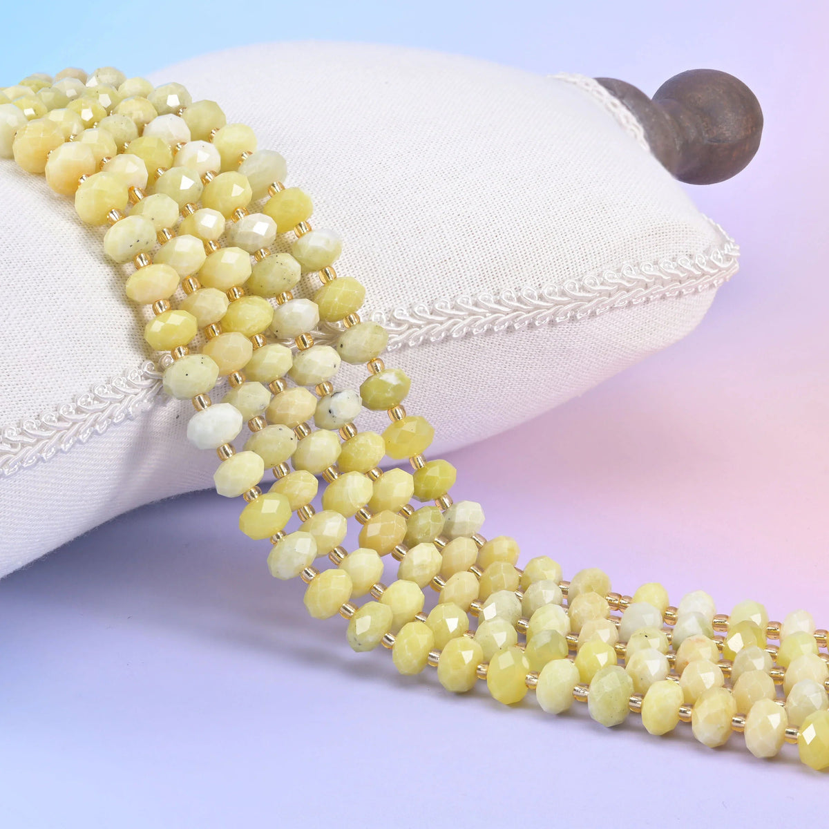 Natural gemstone rondelle beads with a faceted cut