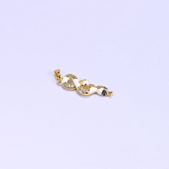 Close-up of one white Enamel Snake Zirconia Charm lying at a diagonal, showing the coiled body, pave scales and navy enamel head.