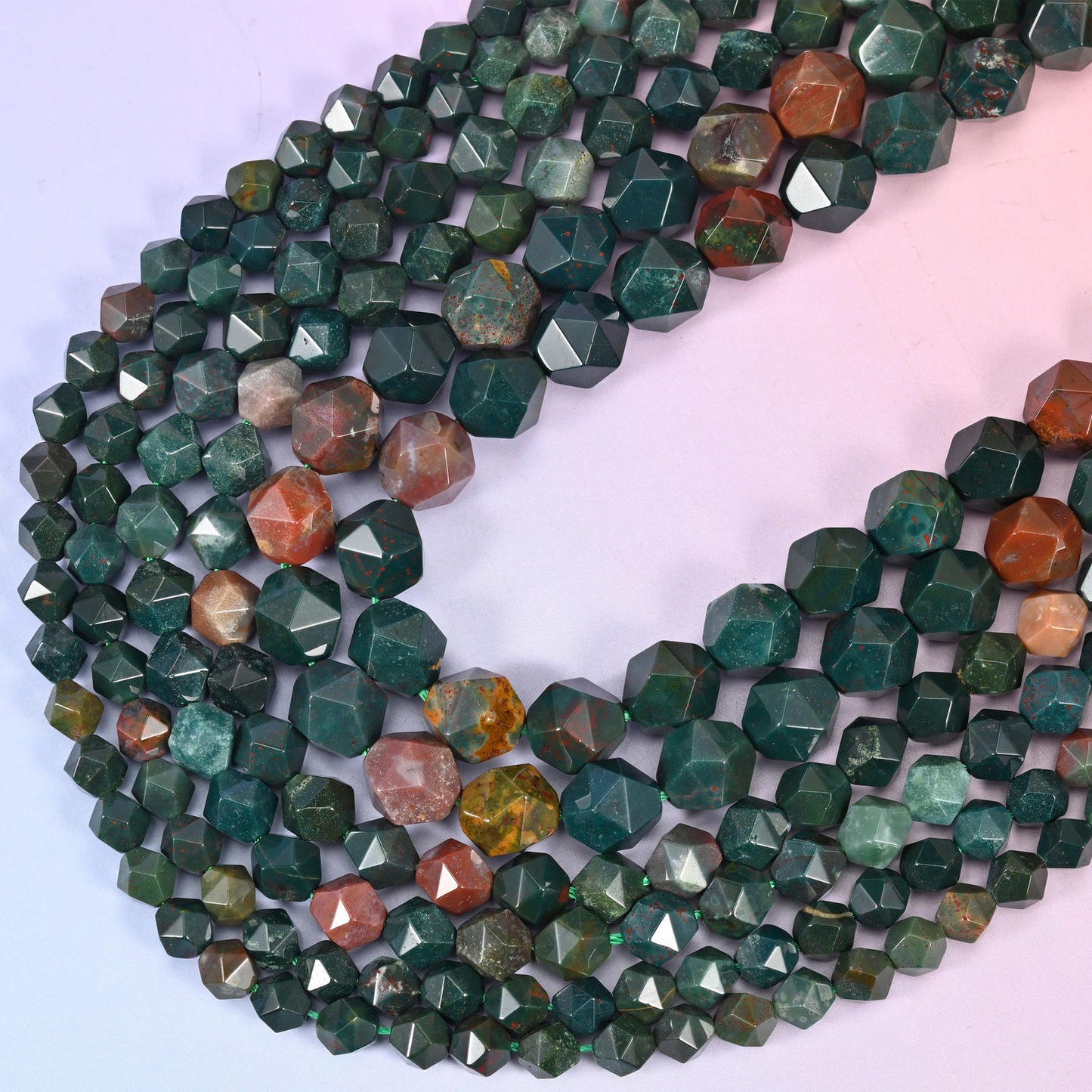 Indian Bloodstone diamond star cut beads, strands crossing in a V, natural Oriental Jasper with the green and red balance varying bead to bead