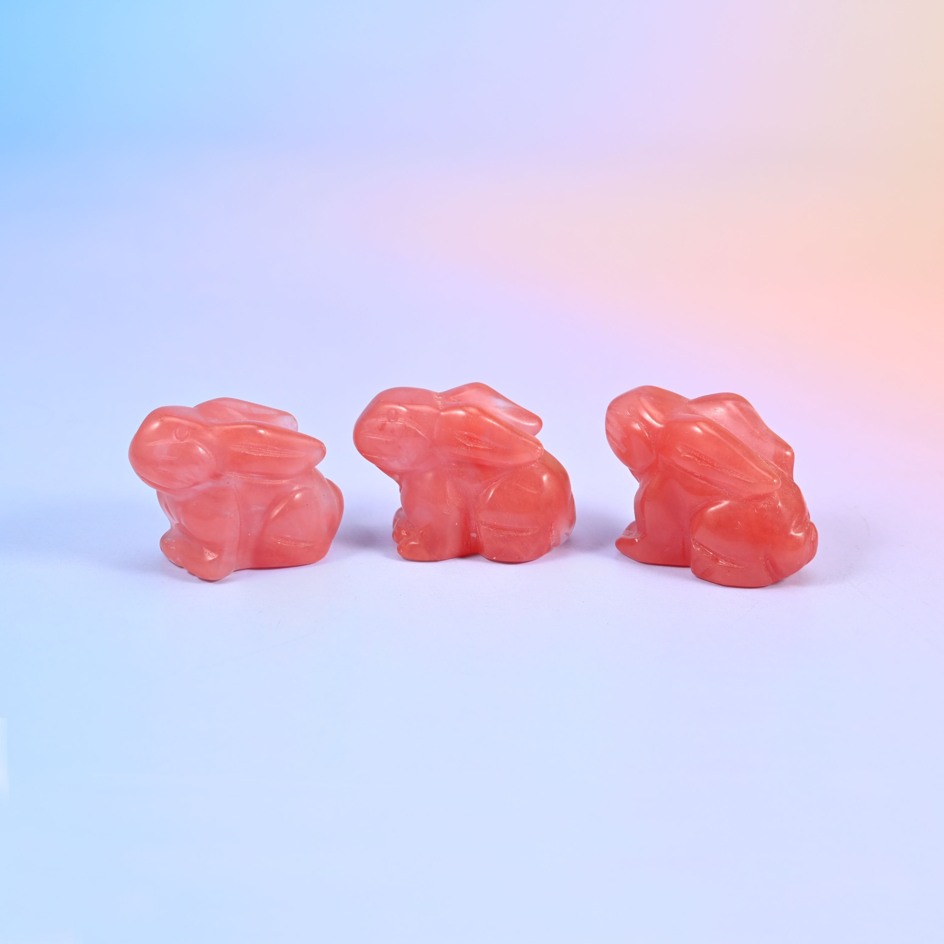 Laying down bunny carving offered in 47 gemstones, from deep green and cream to lilac, coral and blue