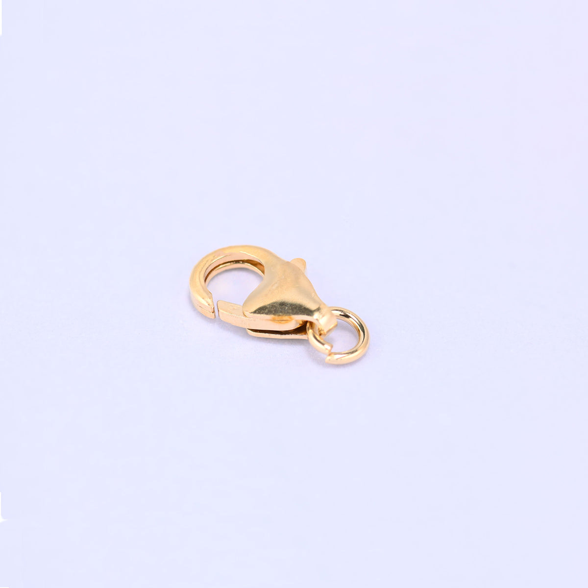 14K gold filled lobster clasp, 6x10mm, angled view with the jump ring at the lower right