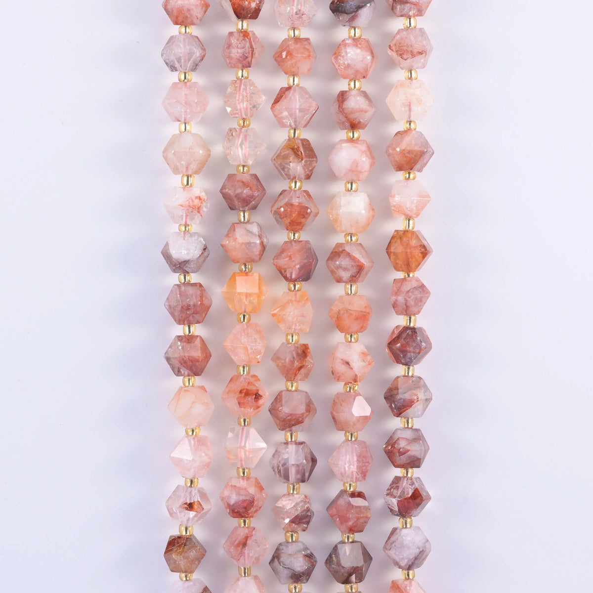 Diamond Rhombus Gemstone Beads, the Dyed Rose Jade option is colour-treated and stays fairly consistent.