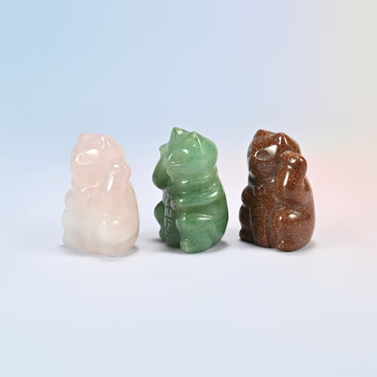 Rose quartz, green aventurine and gold sandstone lucky cats side by side with raised paws