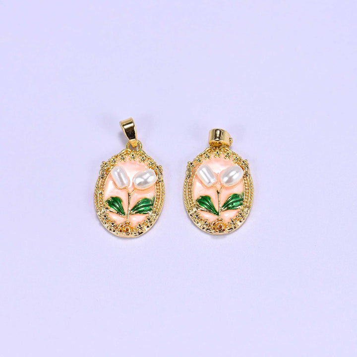 Enamel Oval Tulip Flower Pendants in peach, two gold-plated ovals with faux pearl tulip blooms, green enamel leaves and an ornate gold frame.