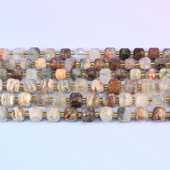 Layer Phantom Quartz beads in milky quartz with rust and tan phantom layers