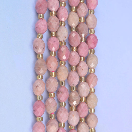 Pink Rhodonite Faceted Rice Barrel Beads, 15.5 inch strand