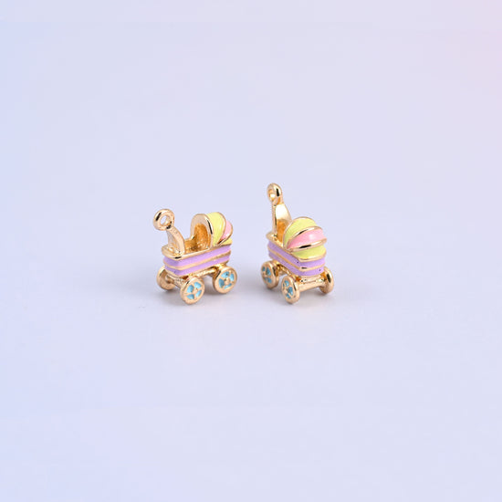 Two light purple stroller charms angled to show the 7.15mm thick three dimensional carriage.