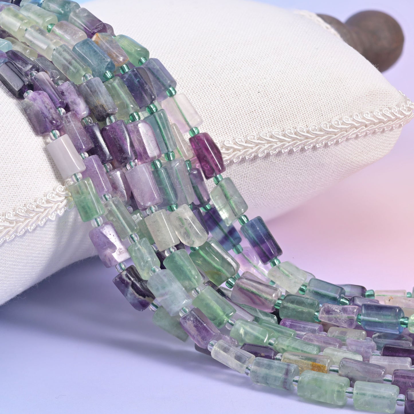 Natural Multi-Color Fluorite faceted tube beads in striking pastel to bold color combinations.