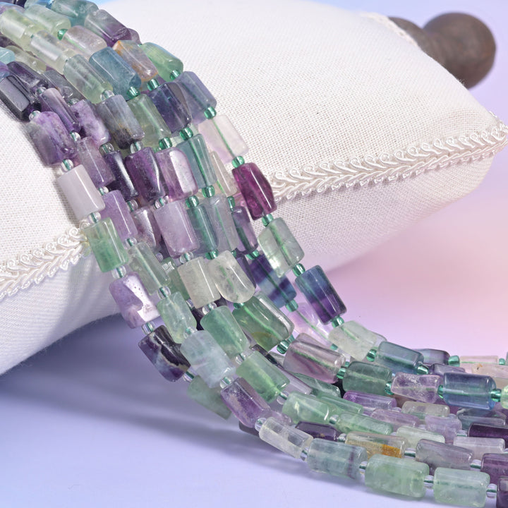 Natural Multi-Color Fluorite faceted tube beads in striking pastel to bold color combinations.