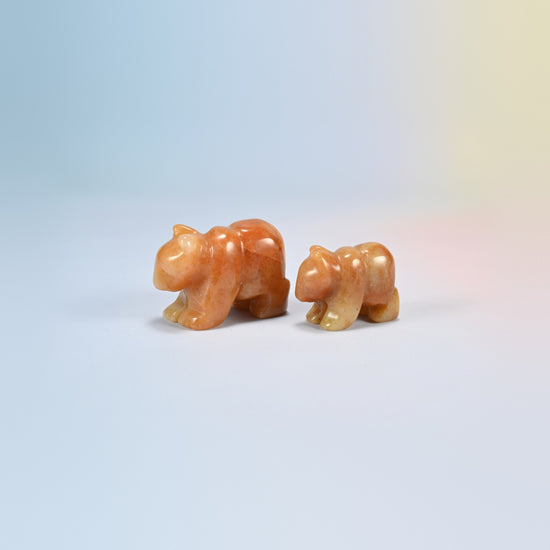 A 2 inch and a 1.5 inch red aventurine bear crystal carving, warm orange natural stone