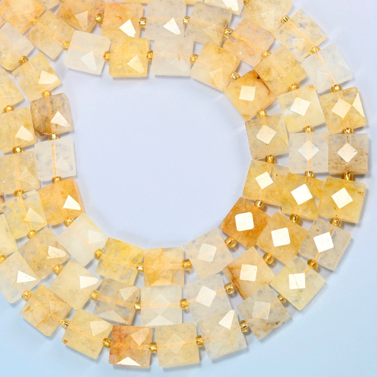 Natural golden healer quartz faceted flat square beads curved into an open loop, golden yellow, honey and cream beads