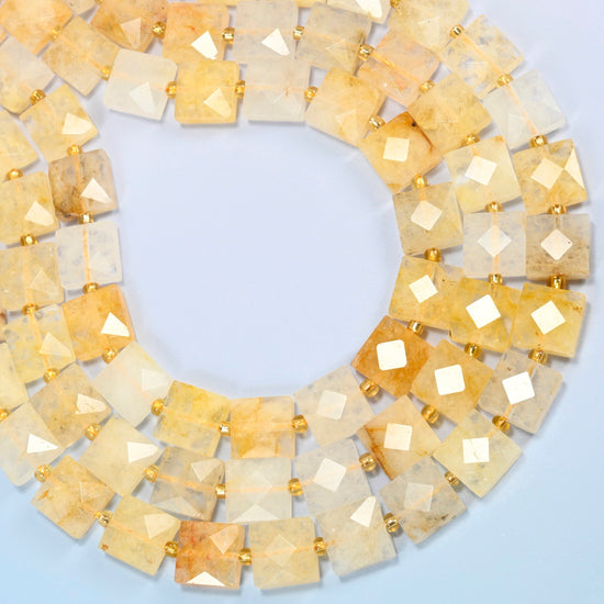 Natural golden healer quartz faceted flat square beads curved into an open loop, golden yellow, honey and cream beads