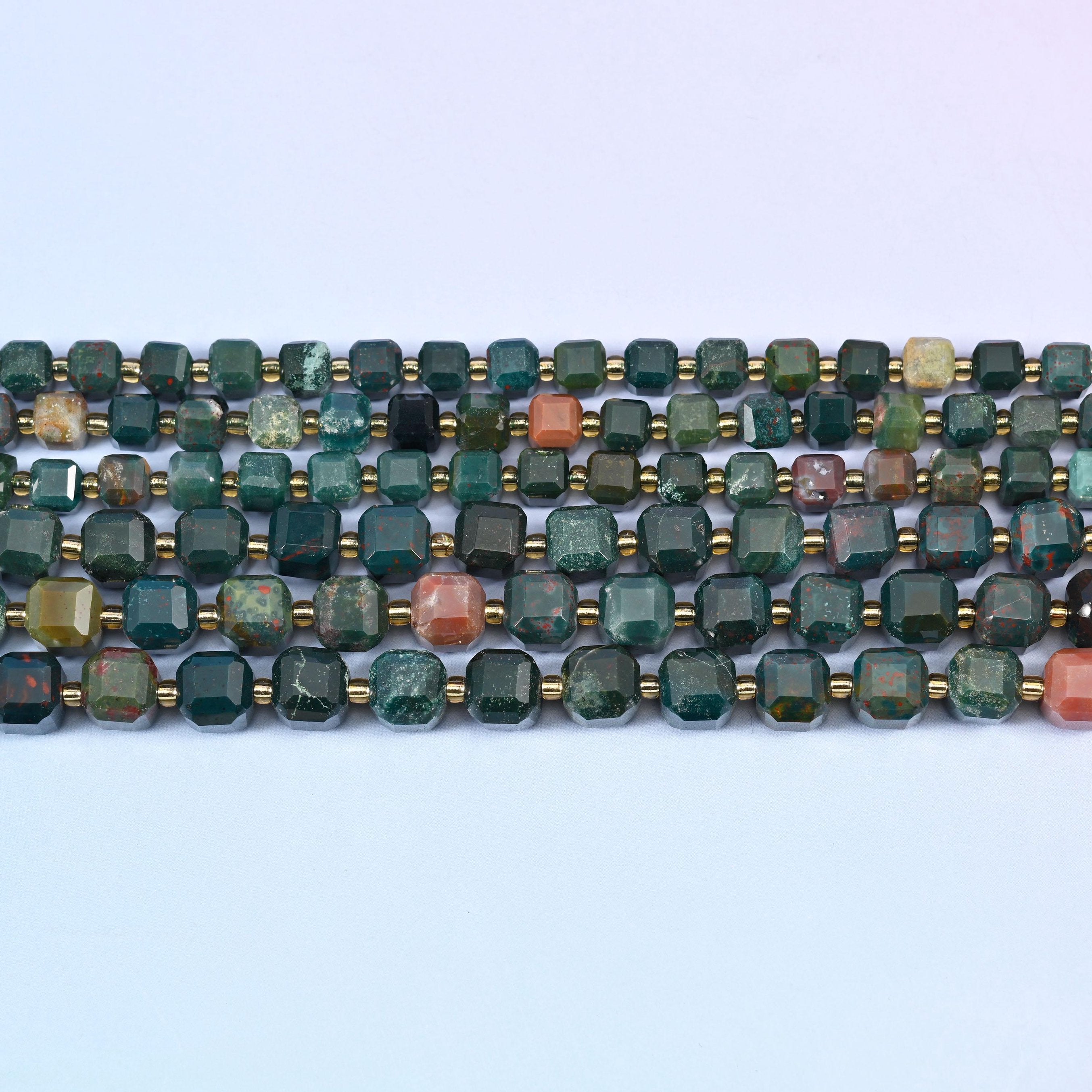 Oriental Jasper beads in deep forest green with coral-pink and rust accents