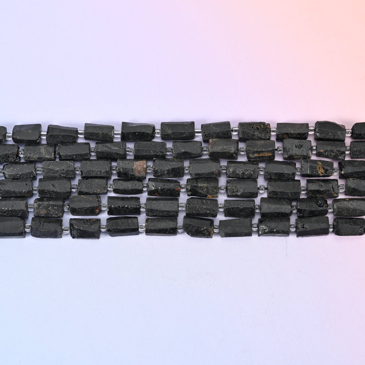 Raw Black Tourmaline Faceted Tube Beads with a sophisticated, modern look