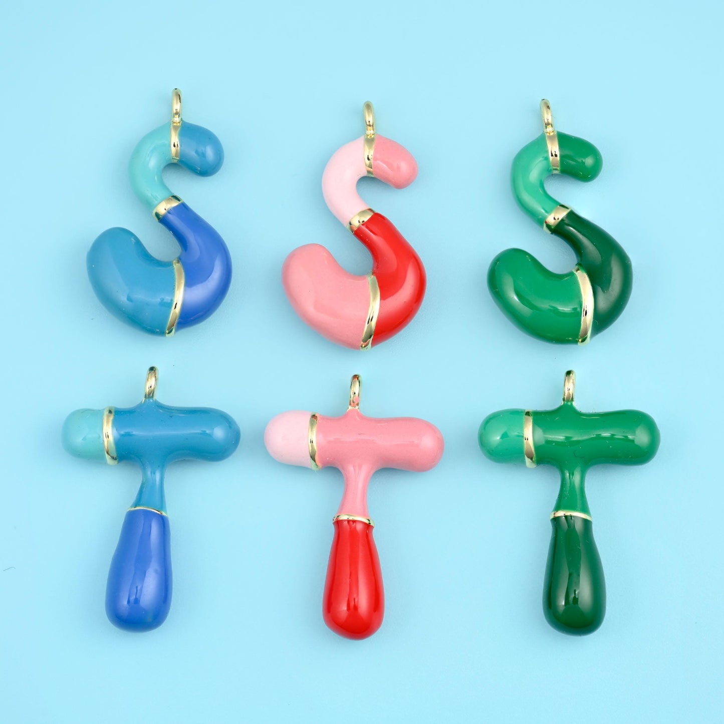 Fat rounded balloon letters glazed in glossy enamel - cornflower blue, blush pink, tomato red, mint and deep forest green -…