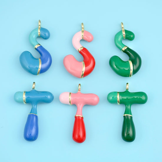 Fat rounded balloon letters glazed in glossy enamel - cornflower blue, blush pink, tomato red, mint and deep forest green -…