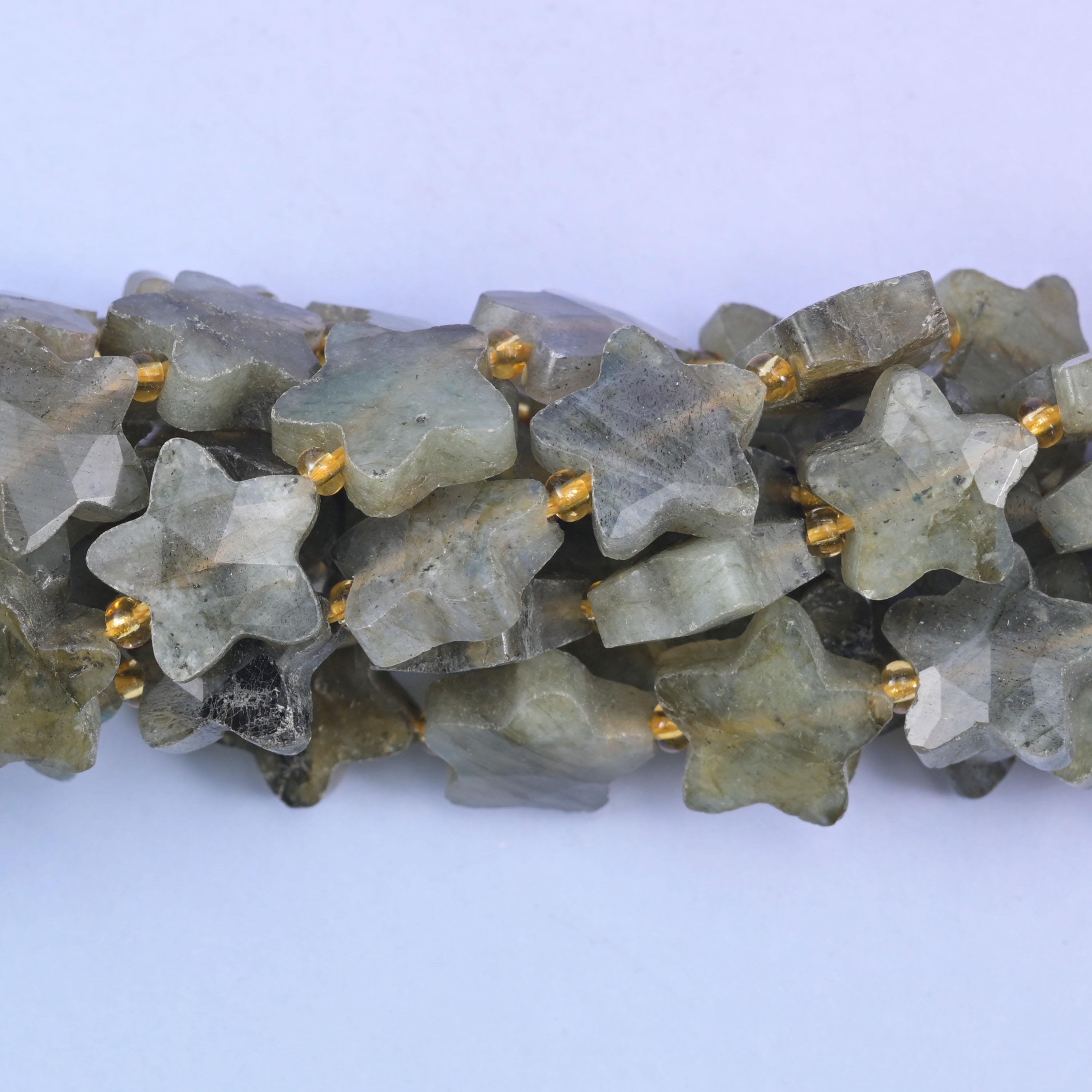 Faceted star cut gray labradorite beads