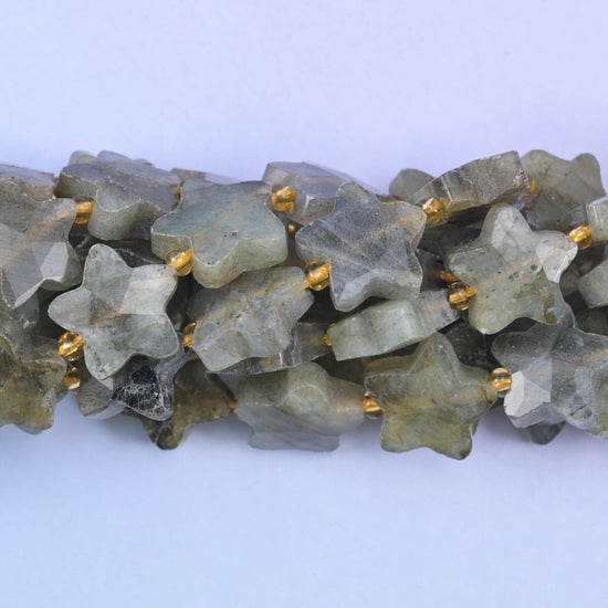 Faceted star cut gray labradorite beads