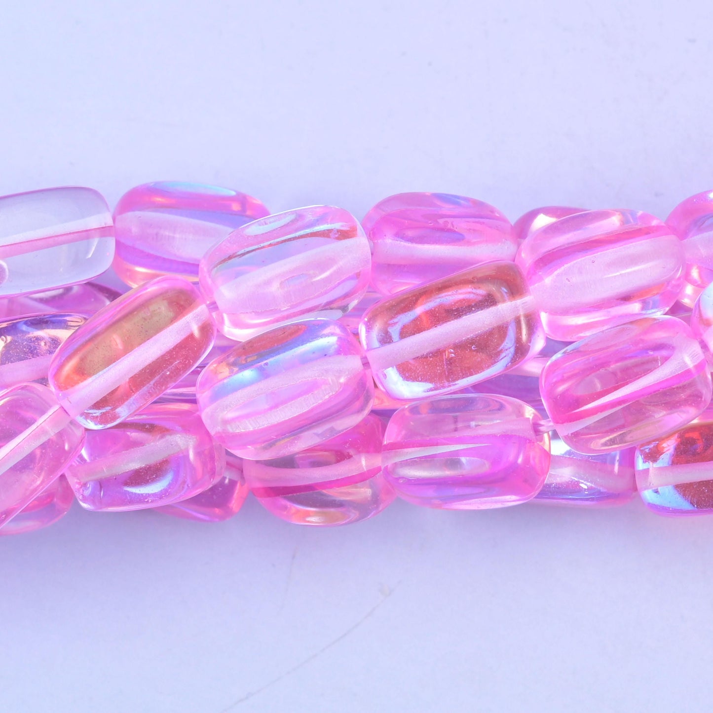 Rectangular cut pink mystic aura glass beads