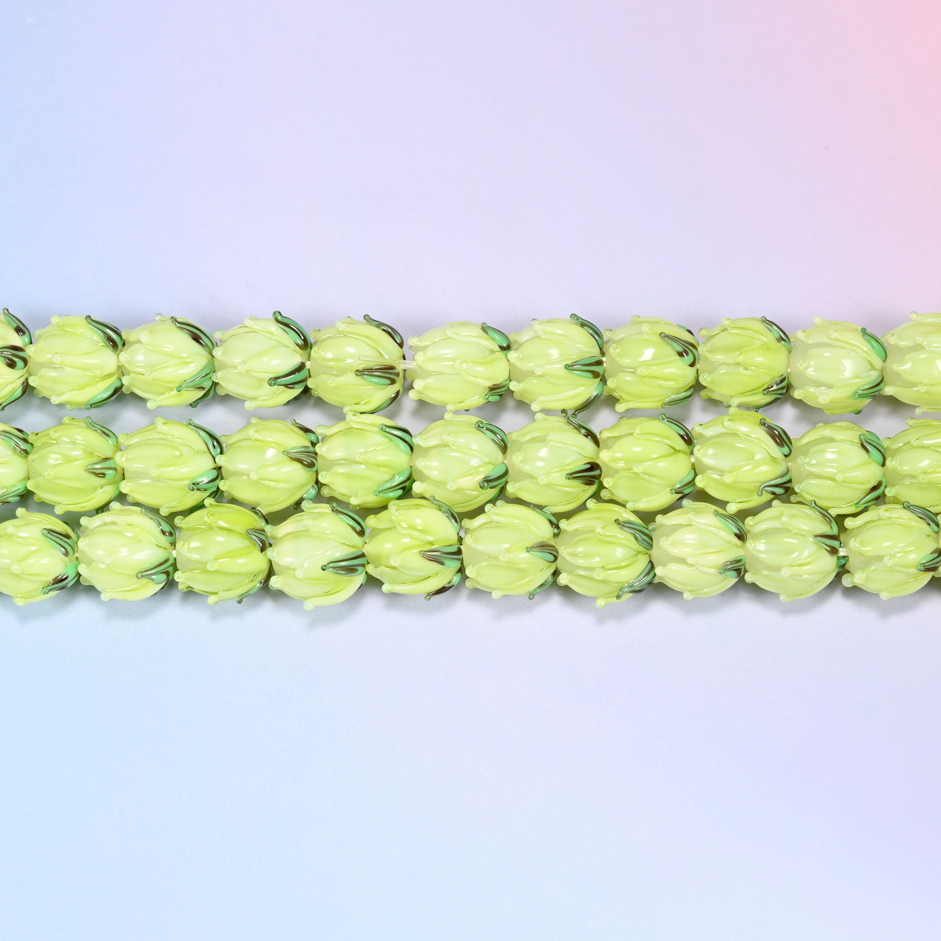Tulip flower bud lampwork glass beads in lime green with green leaf detail