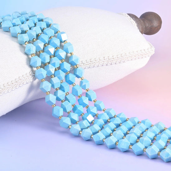 Dyed Blue Howlite faceted diamond rhombus beads in opaque sky-blue