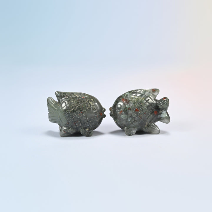 Two 1.5 inch natural African bloodstone tropical fish carvings, dark green with red spots
