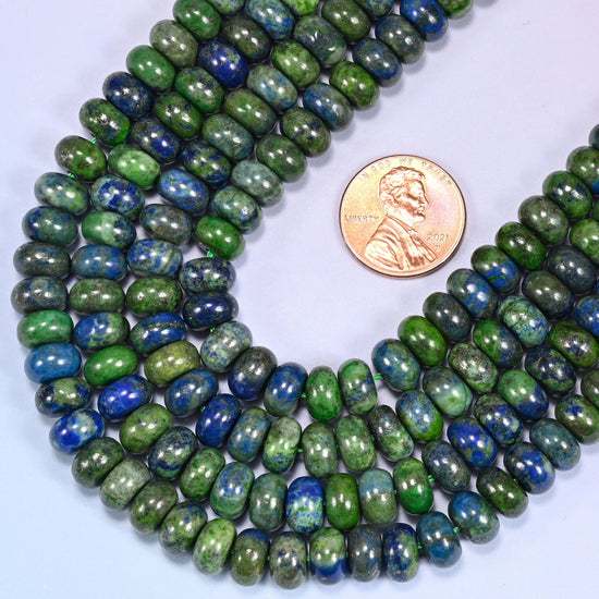 Rondelle cut Natural Phoenix Lapis beads with natural pyrite flecks scattered throughout.
