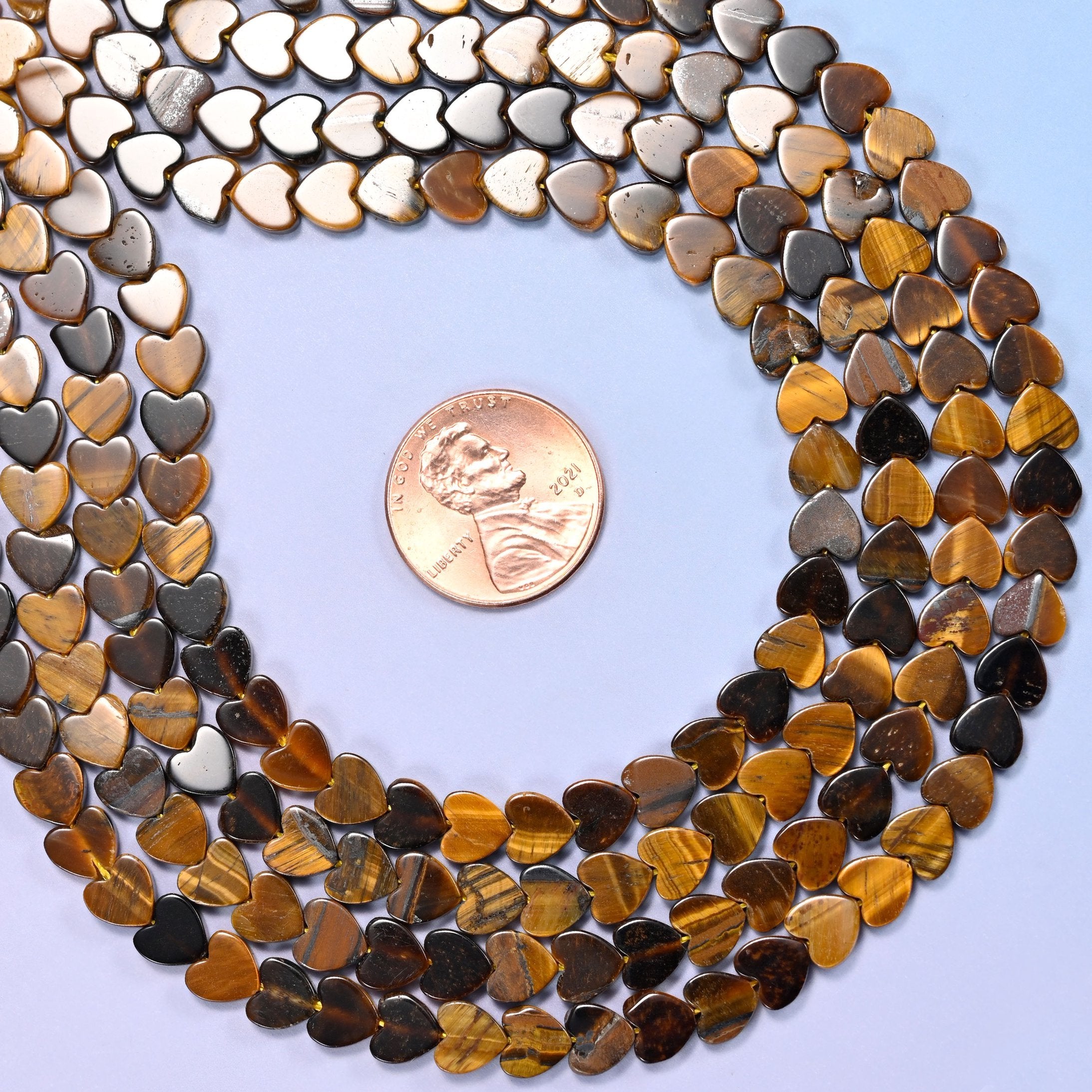 Tiger Eye Flat Heart Beads, honey gold and dark coffee banding with a silky chatoyant sheen