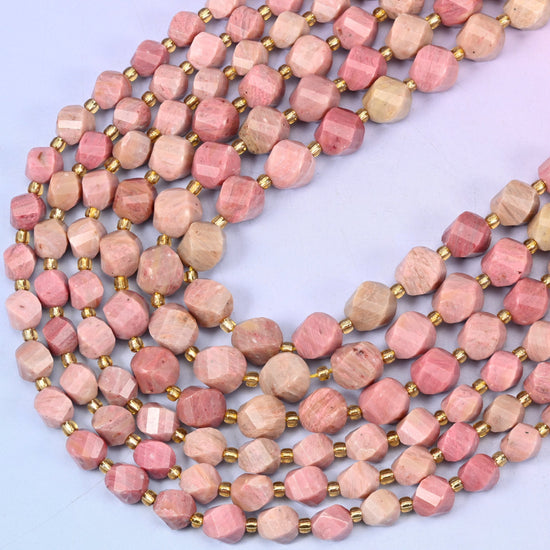 Pink Rhodonite Faceted Spiral Twist Beads, 15 inch strand