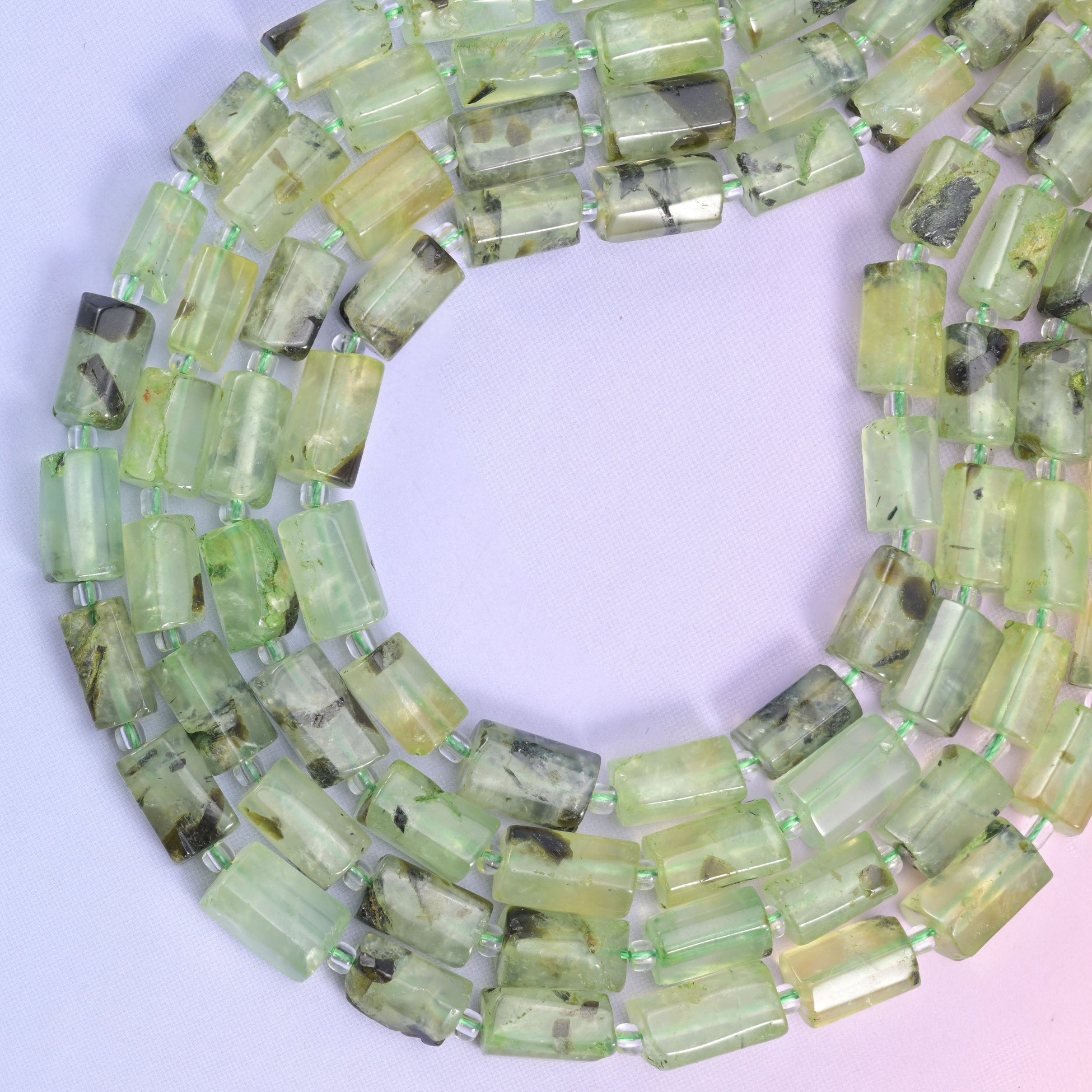 Prehnite faceted tube beads, approximately 29 beads per strand