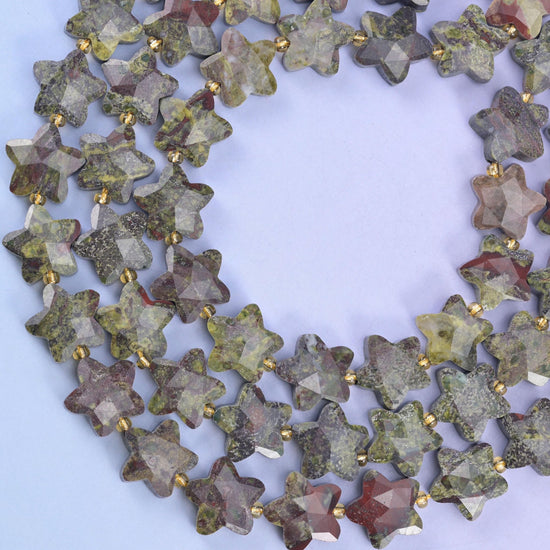 Dragon bloodstone star beads, approximately 27 beads per strand