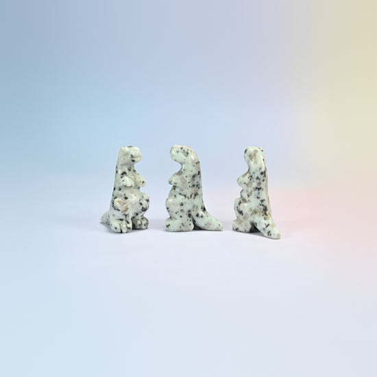 Three kiwi jasper T-Rex dinosaur crystal carvings, 2 inch, cream natural stone with dark spots
