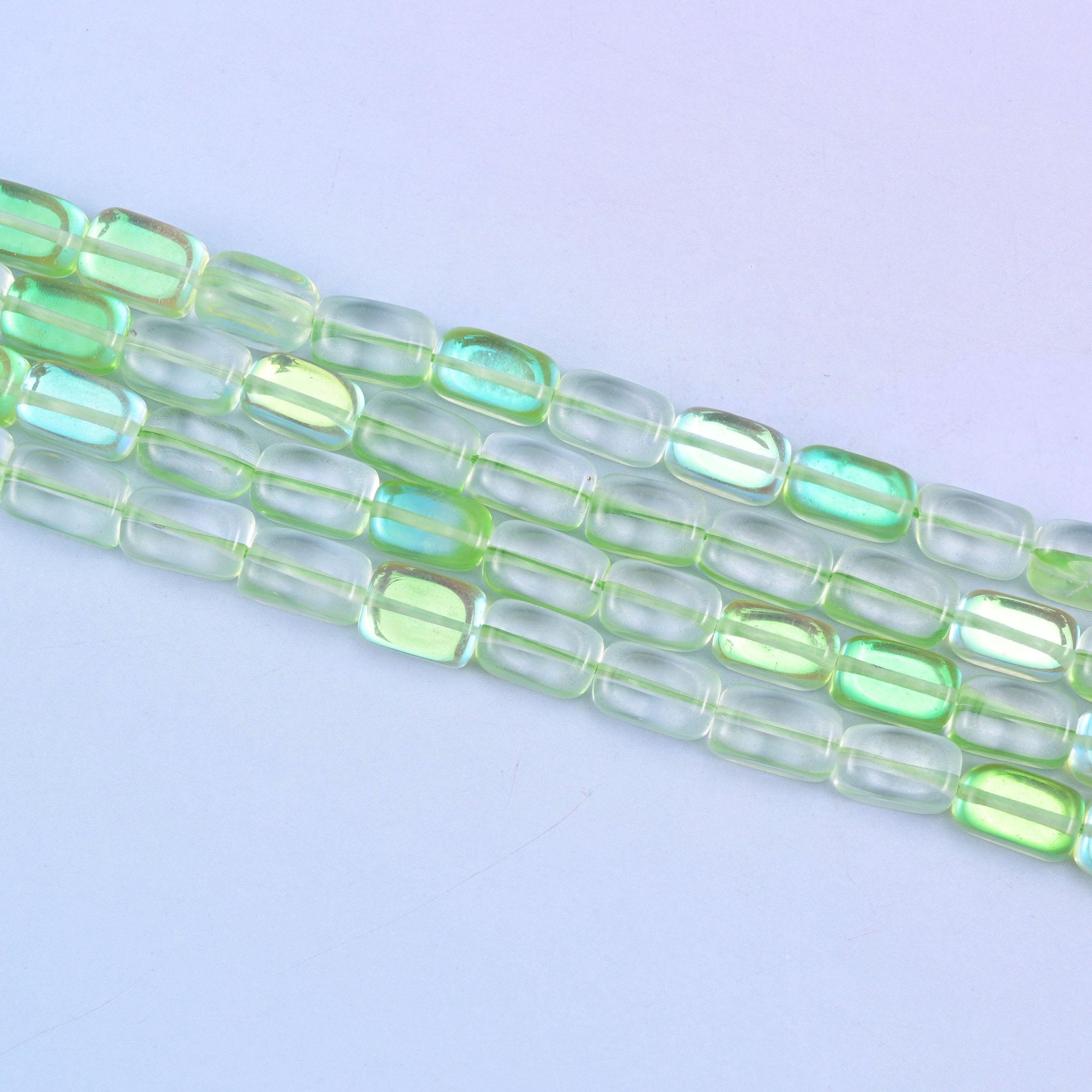 Green Mystic Aura glass beads in a fresh lime-green shine with a subtle iridescent glow