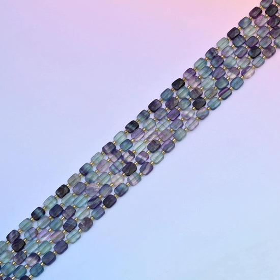 Fluorite beads banded through violet, sea green and aqua
