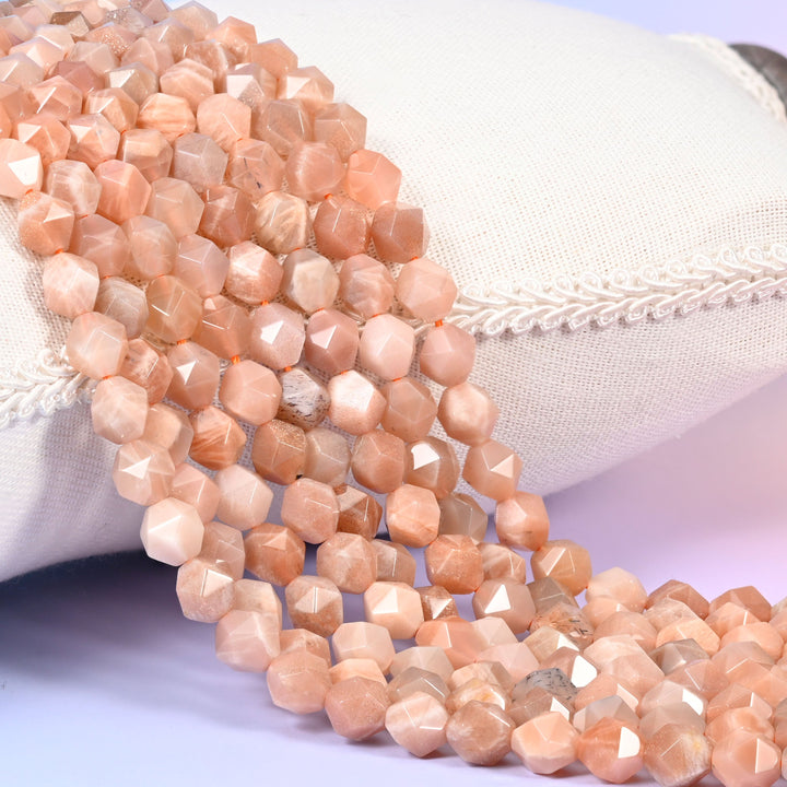Sunstone diamond star cut beads in soft apricot and peach with a golden shimmer