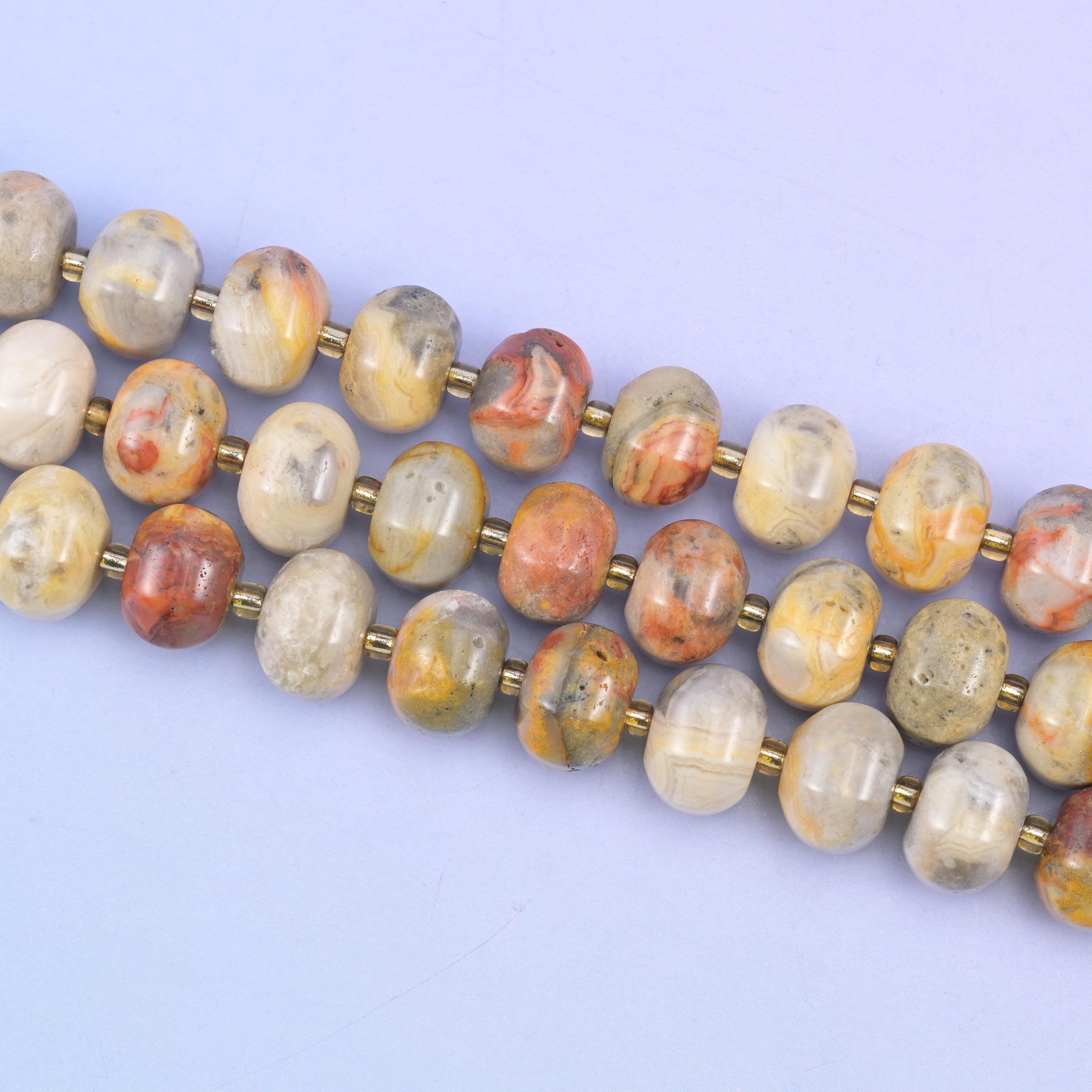 Crazy agate beads in warm cream, tan and terracotta swirl patterns