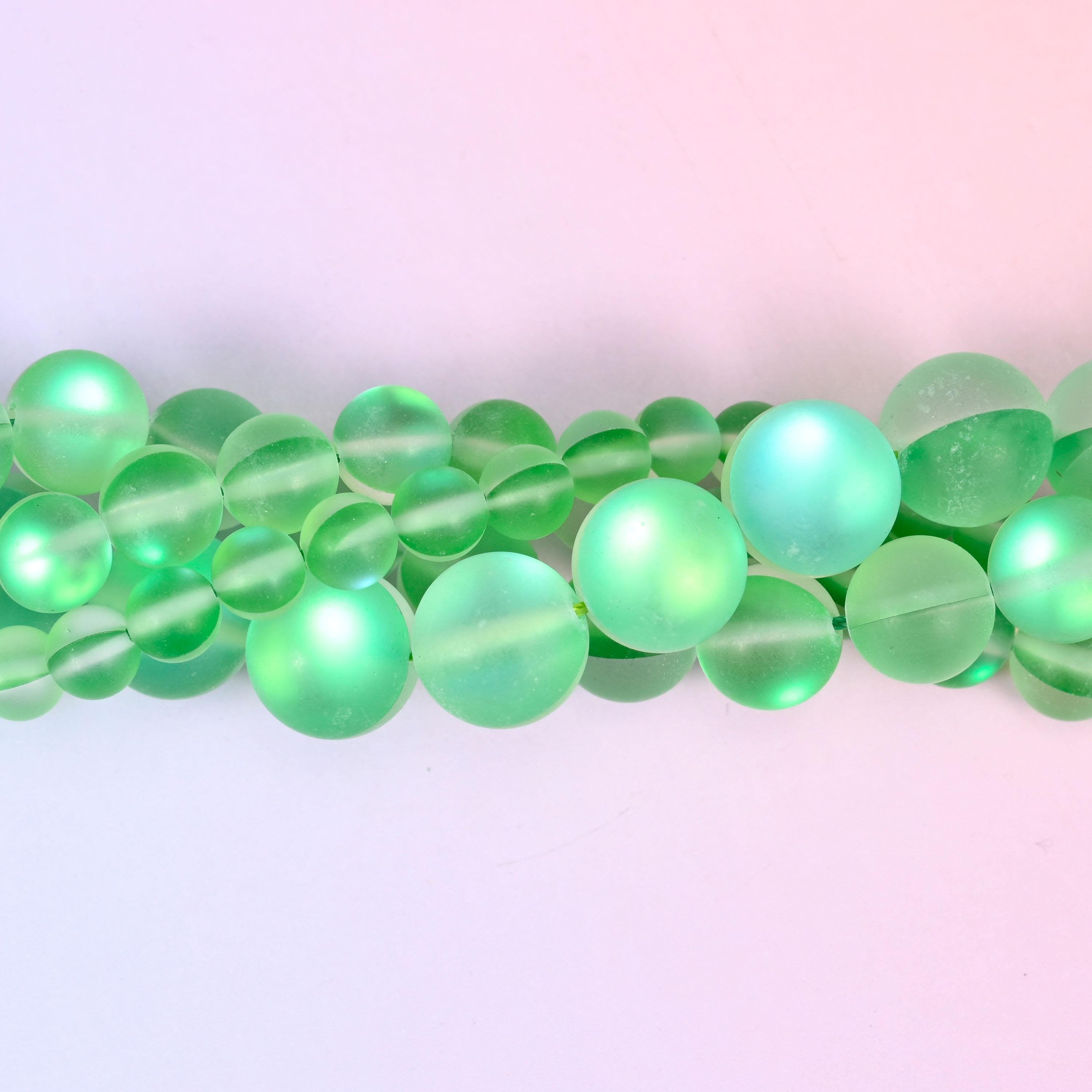 Fresh apple green glass beads with a frosted sea-glass surface