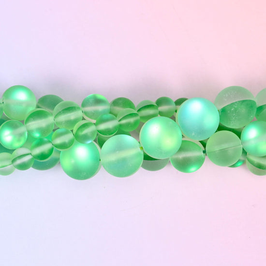 Fresh apple green glass beads with a frosted sea-glass surface