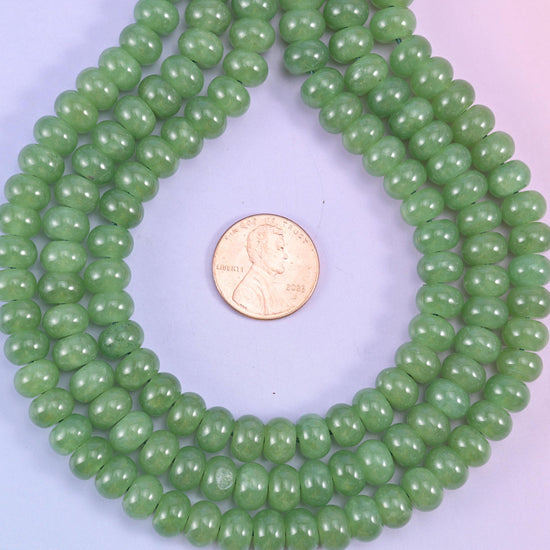 Grass Green Dyed Jade smooth rondelle beads in a fresh, vivid grass green, finished with a smooth, polished surface