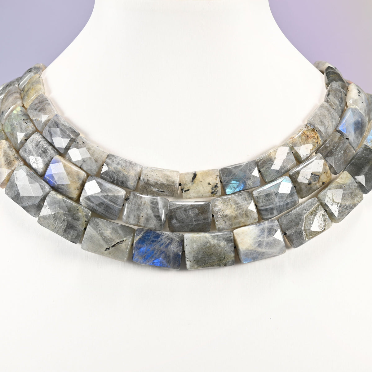 Gray Labradorite faceted flat rectangle beads layered as a collar, several strands showing the 10x14mm through 13x18mm sizes