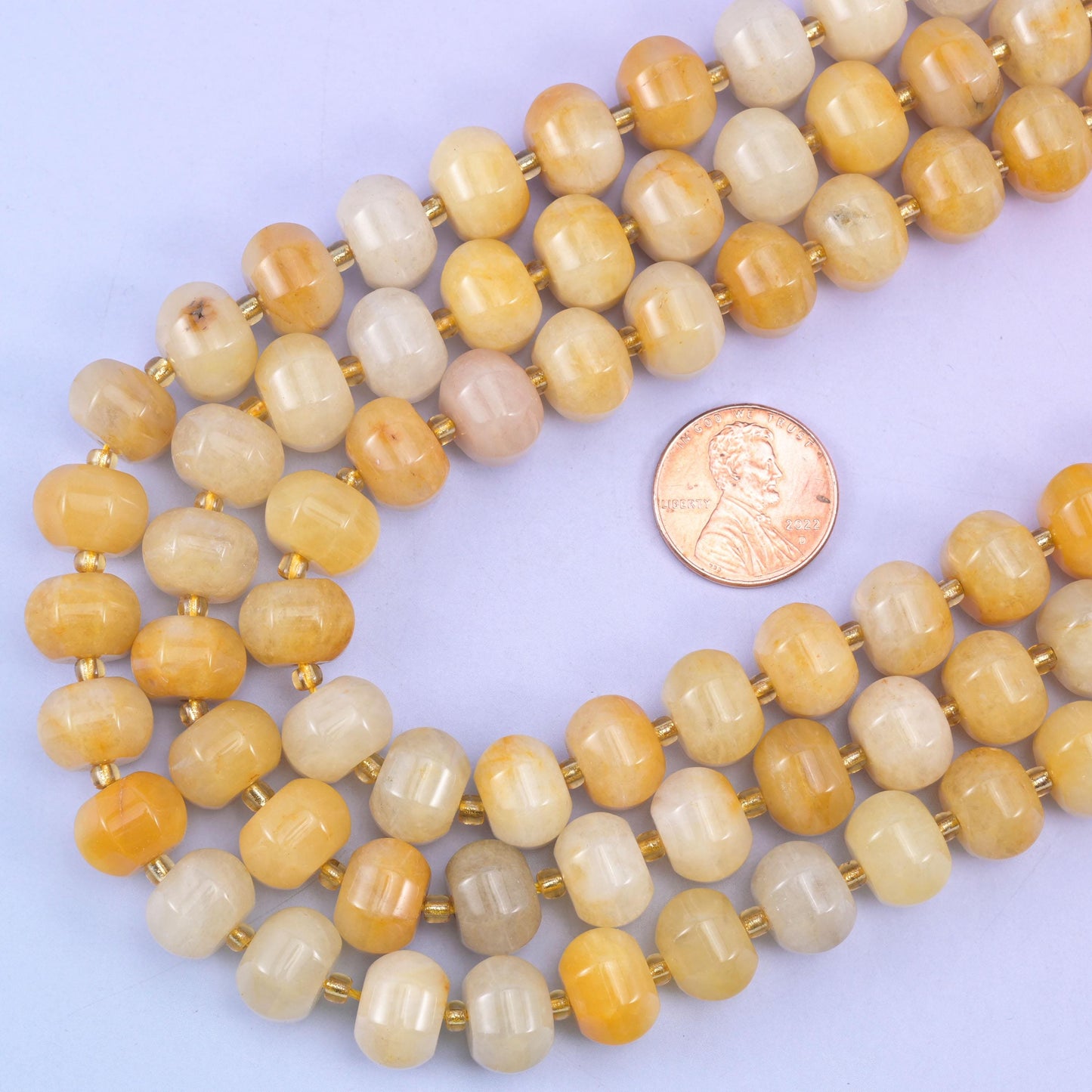 Yellow jade pumpkin beads, 15 inch strand